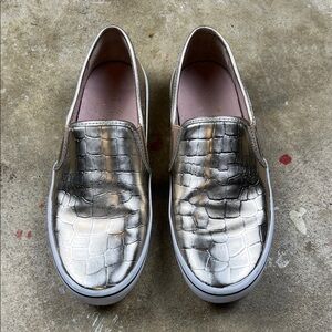 Kate Spade Gold metallic slip on sneaker
Size: 7